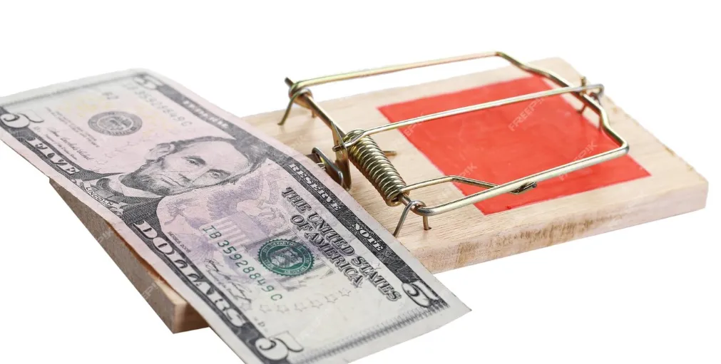 Ratoeira com nota de dinheiro como isca