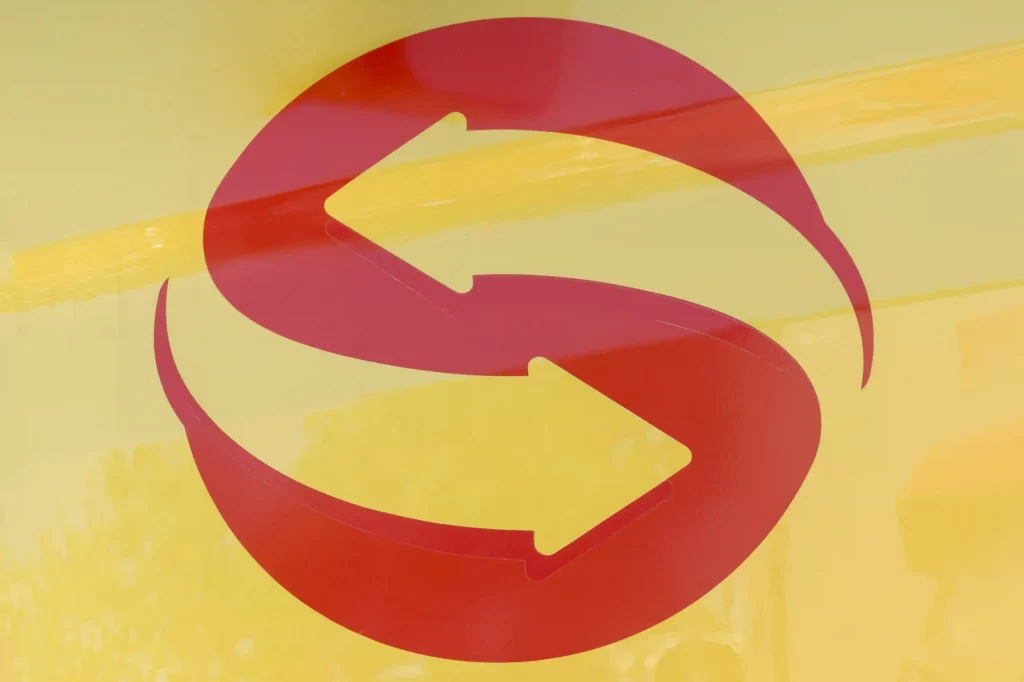 Ícone de setas circulares representando recompra e recorrência de vendas na volta às aulas