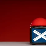 Botão vermelho de rejeição com símbolo “X” em destaque, representando erro ou reprovação em decisões de venda