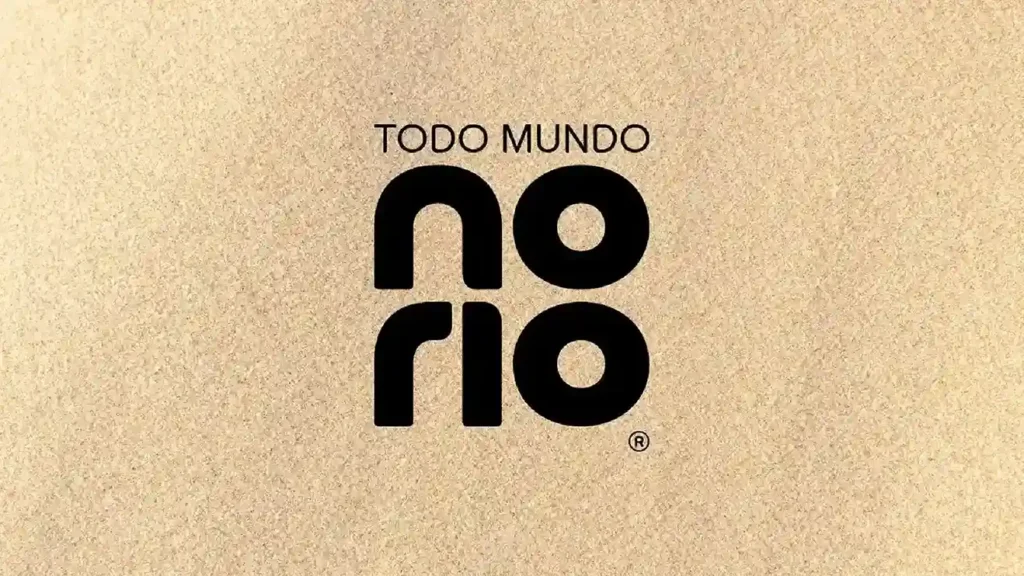 Logo oficial do evento Todo Mundo no Rio em fundo texturizado bege, marca registrada do festival que recebe o show da Shakira no Rio de Janeiro em 2026