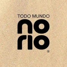 Logo oficial do evento Todo Mundo no Rio em fundo texturizado bege, marca registrada do festival que recebe o show da Shakira no Rio de Janeiro em 2026