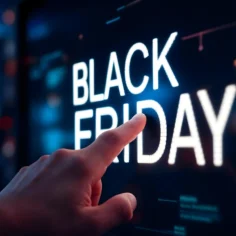 Mão apontando para a expressão Black Friday em uma tela digital com fundo escuro